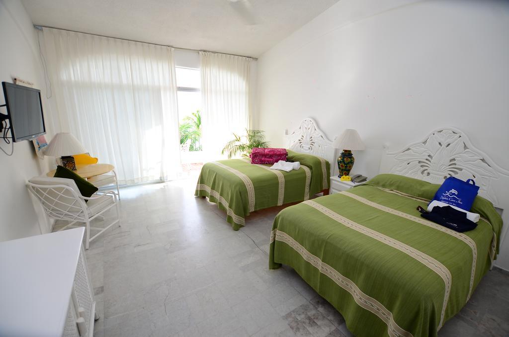 Dolphin Cove Inn Манзанило Екстериор снимка